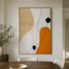 Warm abstract painting with ochre shapes, black linework, and textured ivory ground