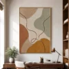 Minimalist abstract canvas with ochre shape and brown looping line